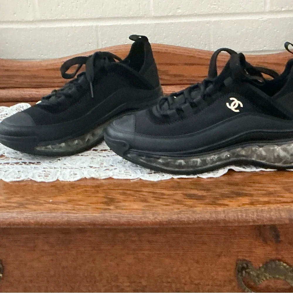 CHANEL Black Women’s Sneakers with Gold Logo